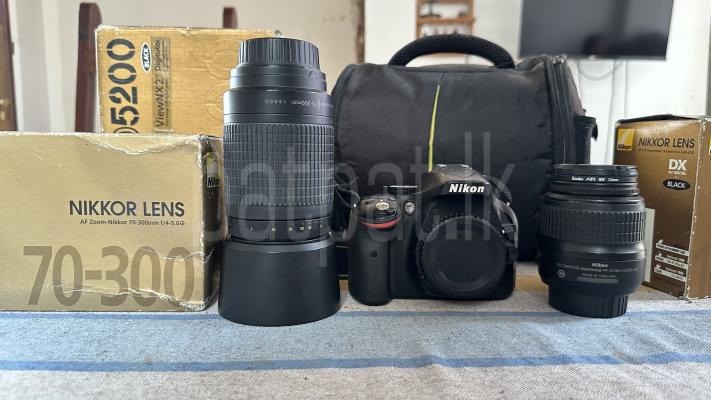Nikon D5200 Camera එකක් – Kit Lens + Zoom (70-300mm) Box සමඟ