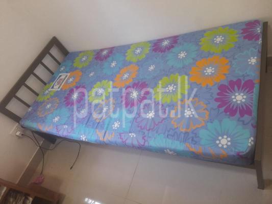 Steel bed with mattress