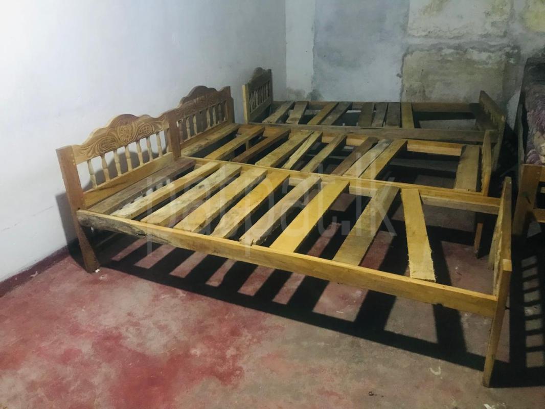 Wooden single beds