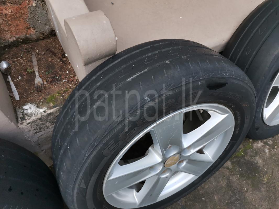 Original Mitsubishi alloy wheels with tyres ads-image-1