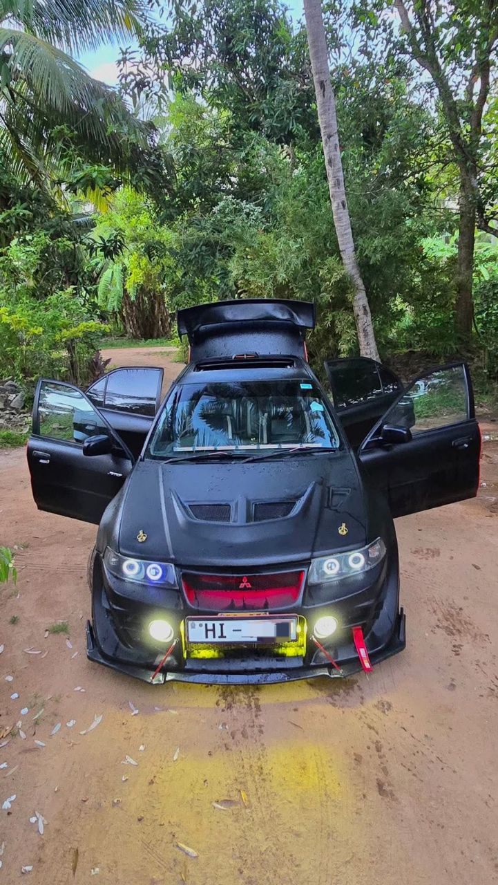 Mitsubishi Lancer 2000 ads-image-1