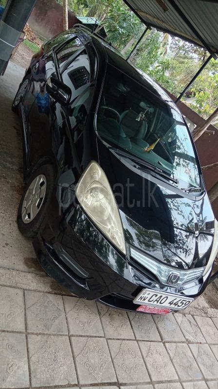 Honda FIT SHUTTLE 2014 - பயன்படுத்தப்பட்டது கார் sale in Sri Lanka - patpat.lk