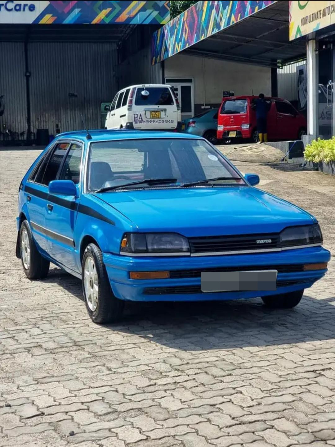 Mazda Familia 1987 ads-image-1