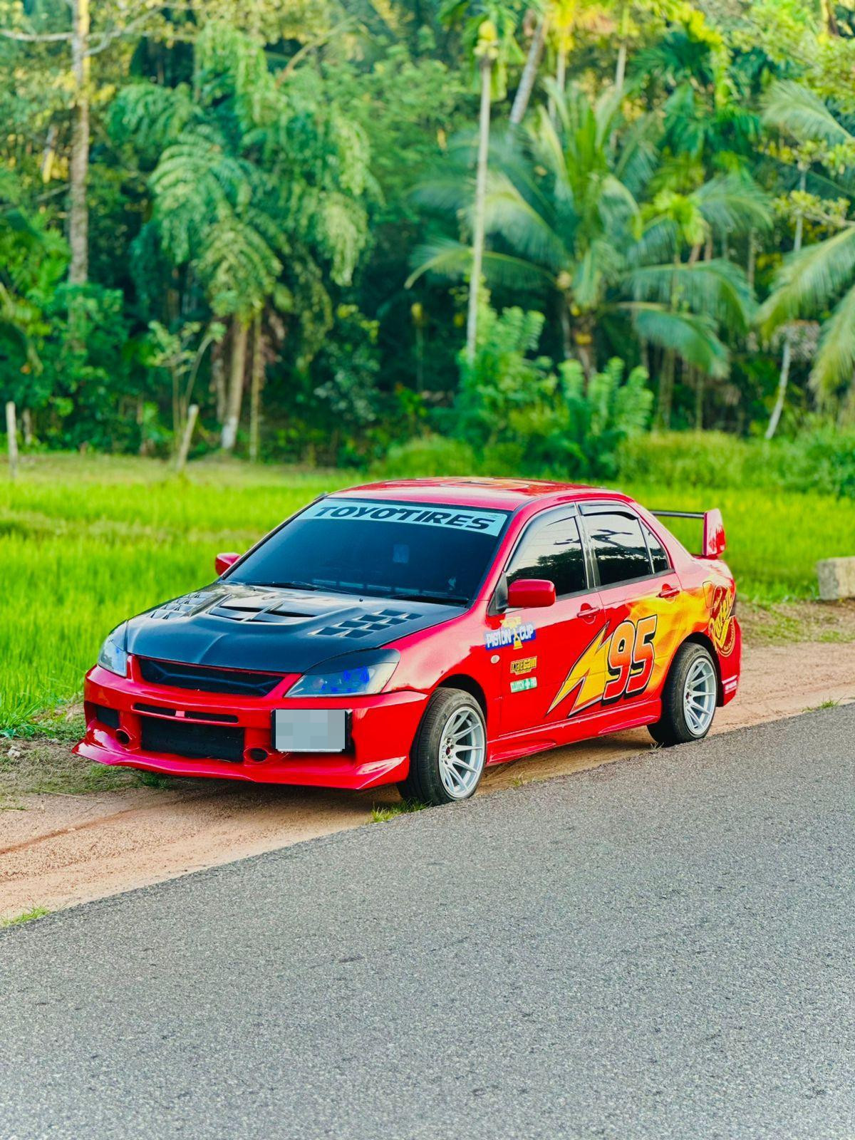 Mitsubishi Lancer 2003 ads-image-1