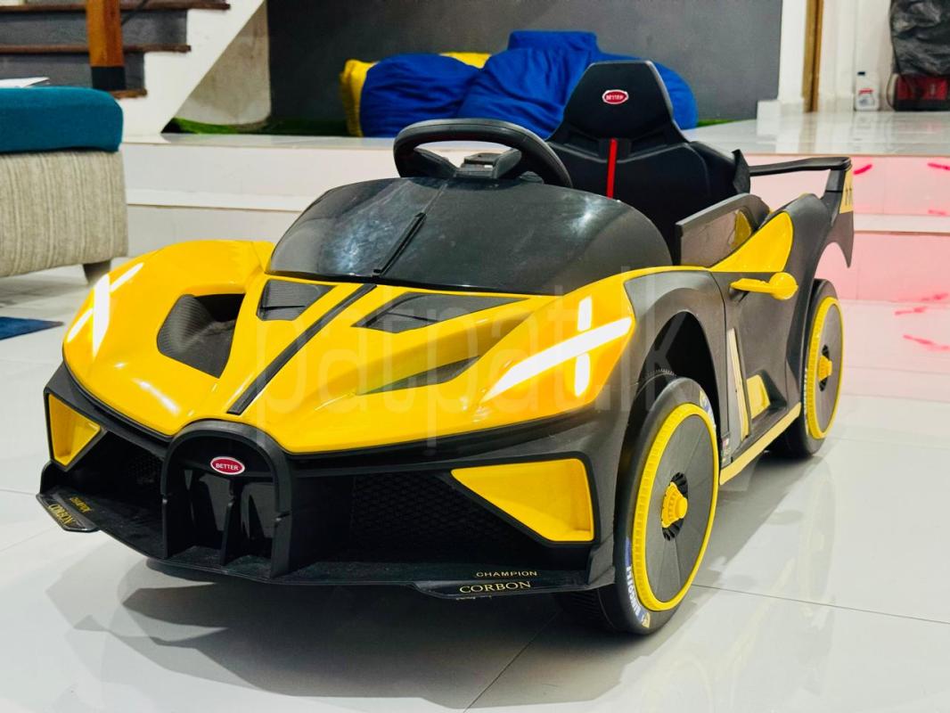 A Used Kids Rechargeable Ride-On Sports Car – Yellow Bugatti Style
