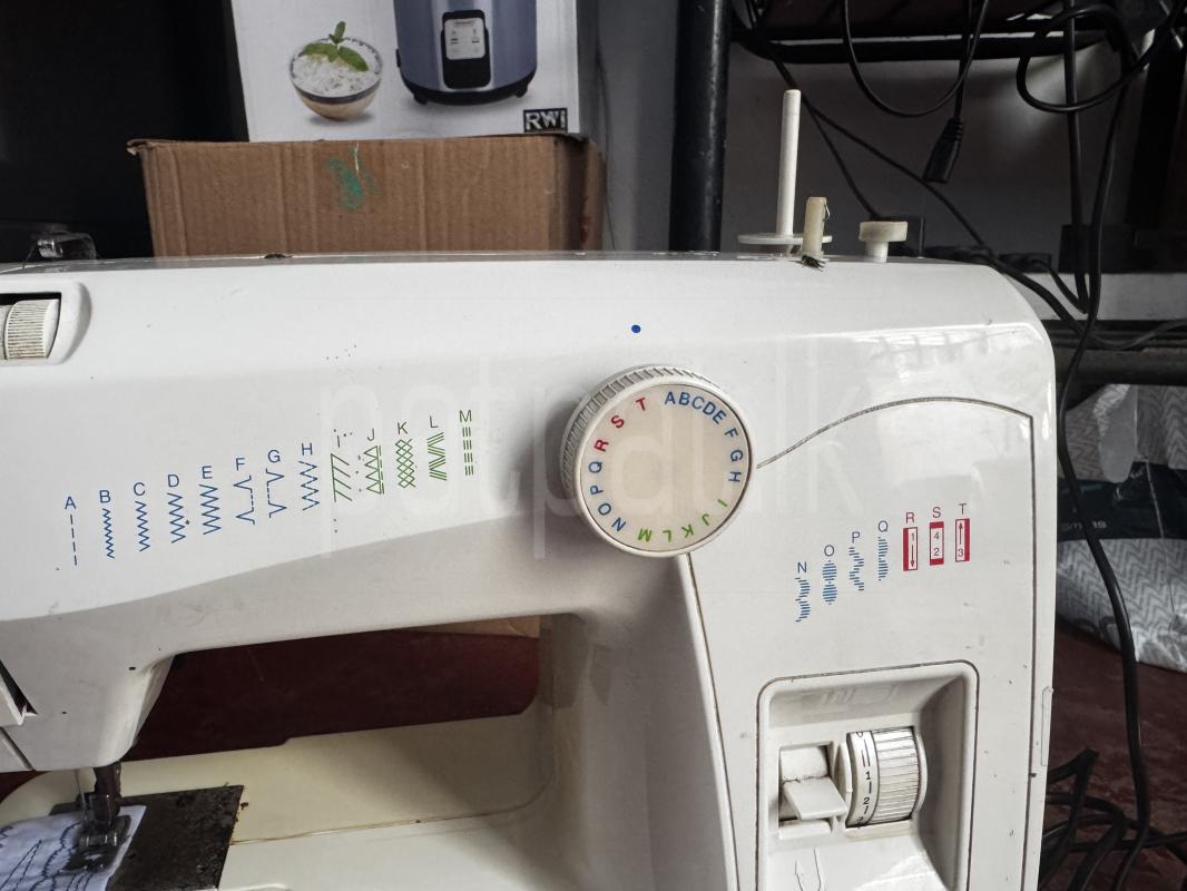 Singer Portable 8215 Sewing Machine ads-image-1