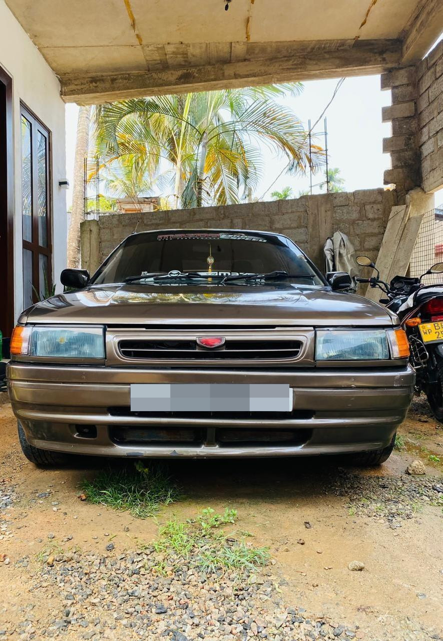 Mazda 323 1990 ads-image-1