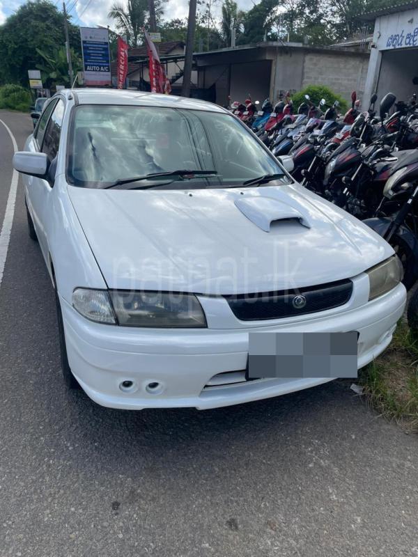 Mazda Familia 2000 - பயன்படுத்தப்பட்டது கார் sale in Sri Lanka - patpat.lk