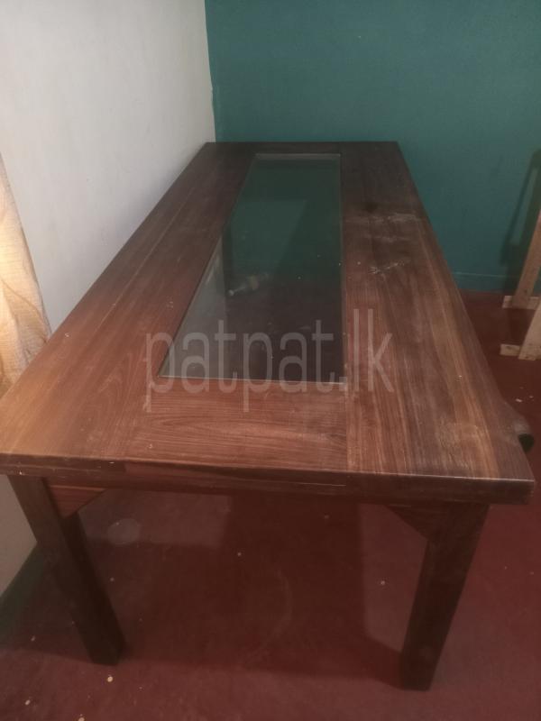 Teak dining table