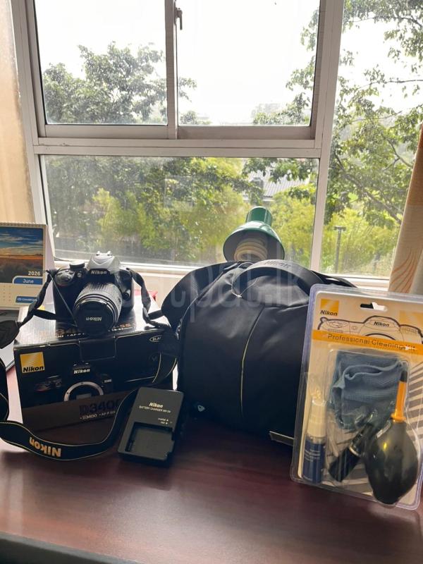 Nikon D3400 DSLR Camera with 18-55mm Lens for Sale