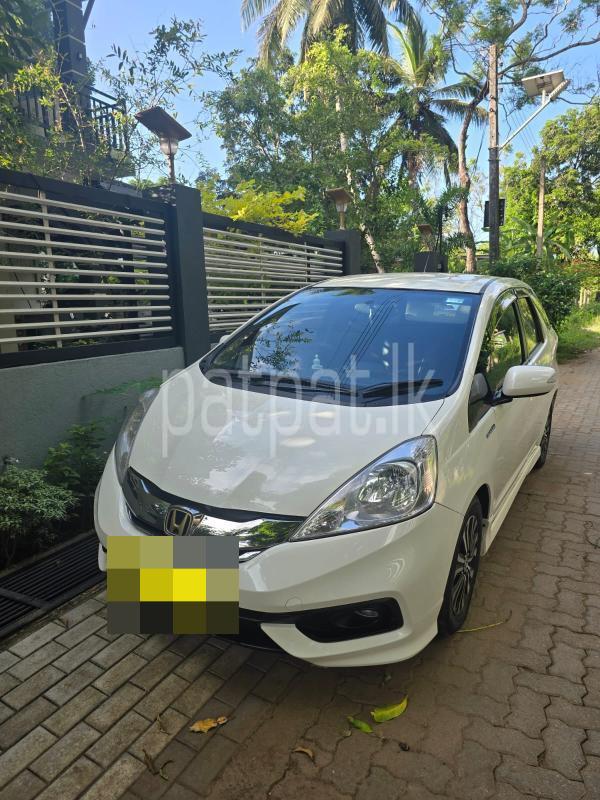 Honda FIT SHUTTLE 2013 - பயன்படுத்தப்பட்டது கார் sale in Sri Lanka - patpat.lk