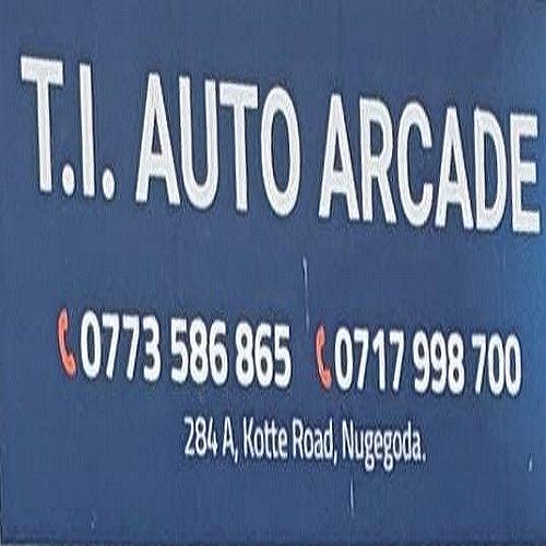 T I Auto Arcade logo