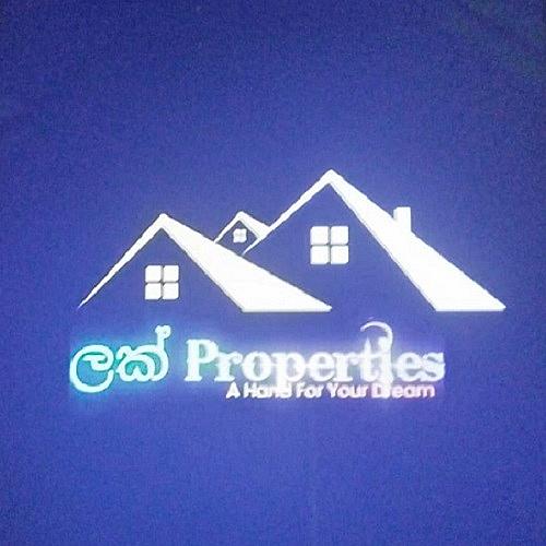 LUCK PROPERTIES logo