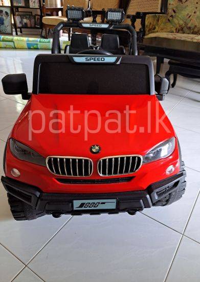 Kids’ Electric Ride On Car