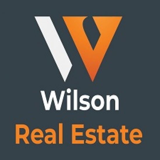 Wilson Real Estate logo