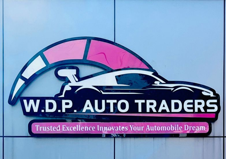 W D P AUTO TRADERS logo